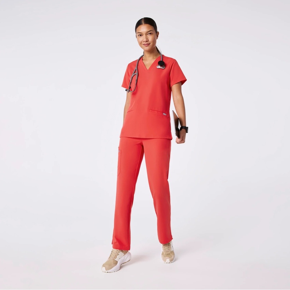 Figs Women's Casma Three Pocket Scrub Top in Pop Red size Small